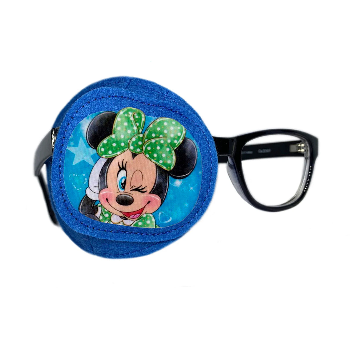Blue wool felt eye patch showing a cartoon mouse with round ears wearing a large green polka-dot bow, winking against a starry background