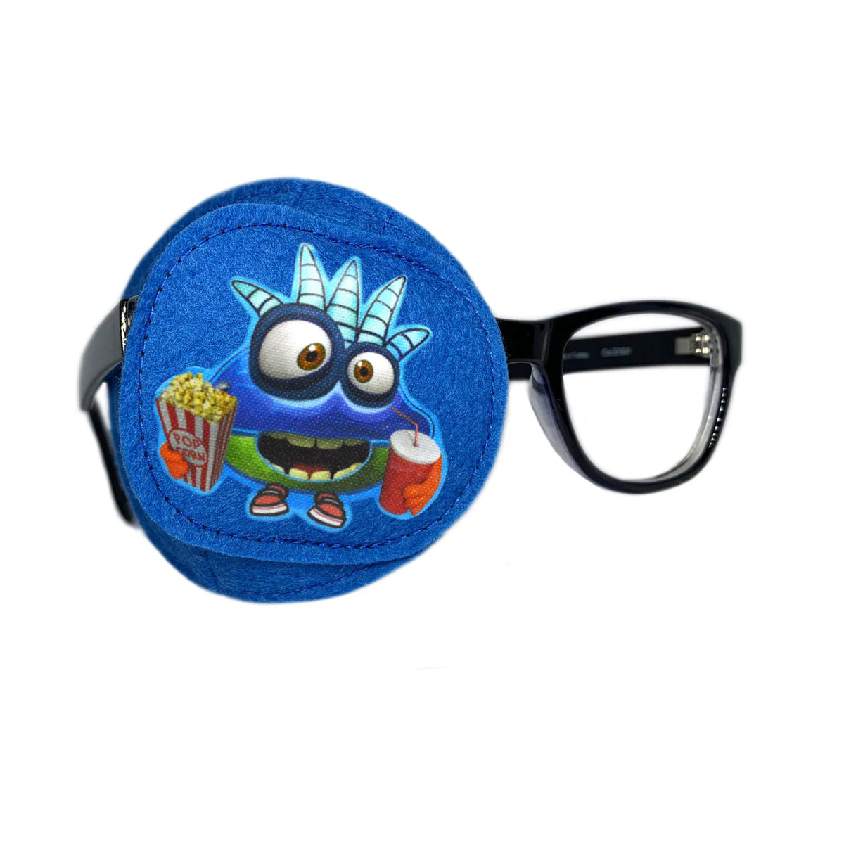 Blue fabric eye patch with a smiling monster holding popcorn and a drink, on glasses